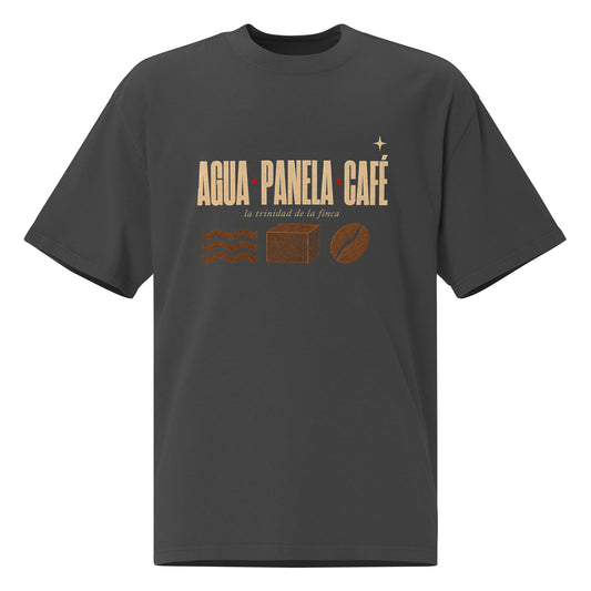 AGUA PANELA CAFÉ oversized faded black tee front - tipografía wide bold crema con los 3 iconos xilográficos: agua, panela, grano de café - estrella decorativa - cartel revolucionario paisa PaisaRican