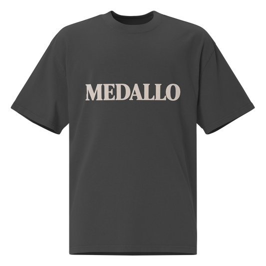 MEDALLO cream text on black faded oversized tee — Medellín Colombia streetwear