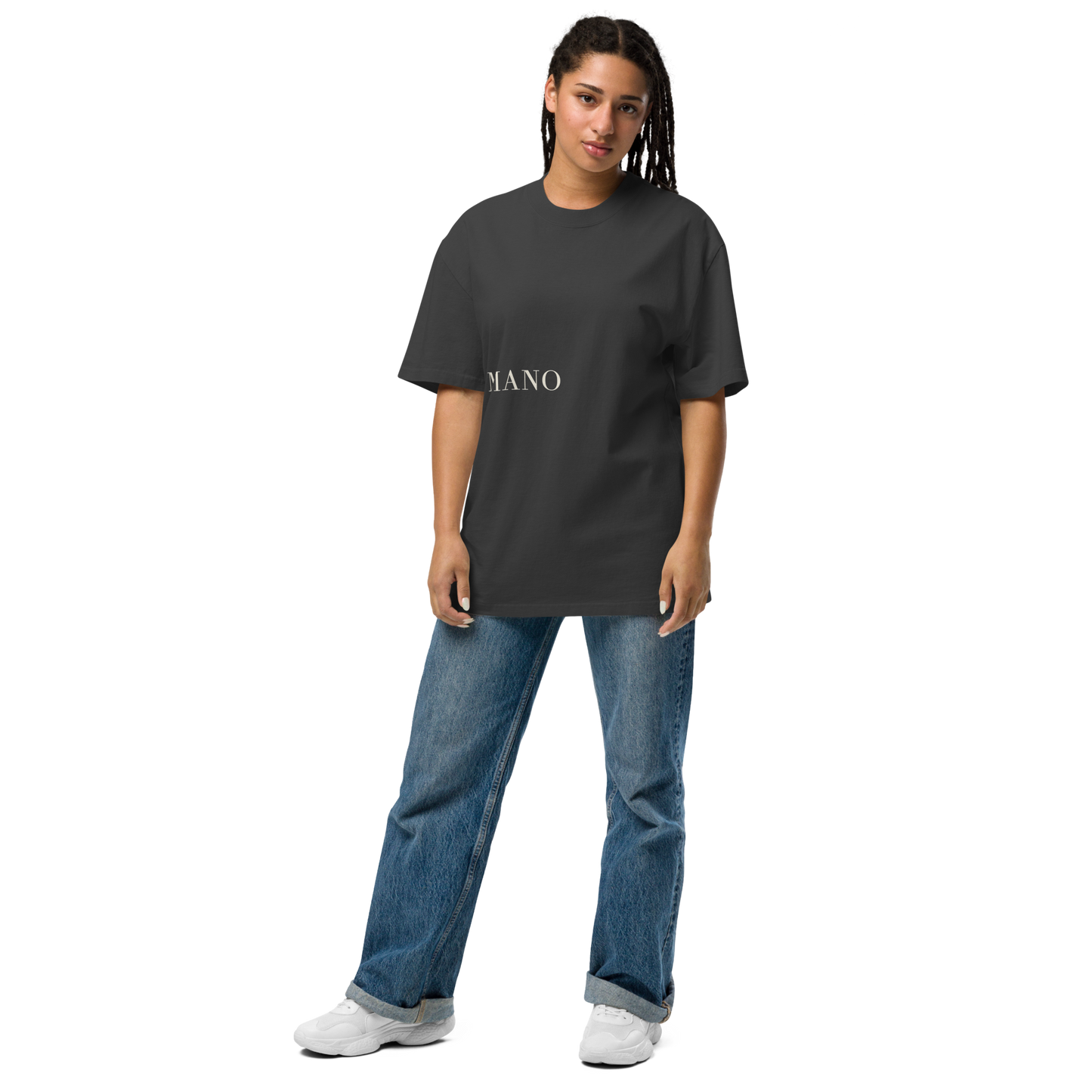Camiseta oversized faded negra con texto "MANO" — streetwear cultural latino PaisaRican